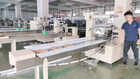 Machine d'emballage de sacs à main d'imitation Machine d'emballage alternative Machine d'emballage automatique d'oreiller Robot manipulateur Machine d'emballage auxiliaire